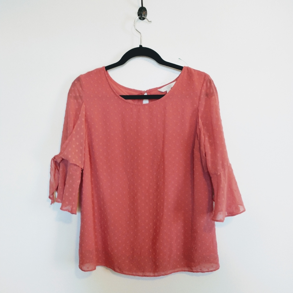 Pink blouse lined with textured polkadot hearts. Lauren Conrad size small, littl